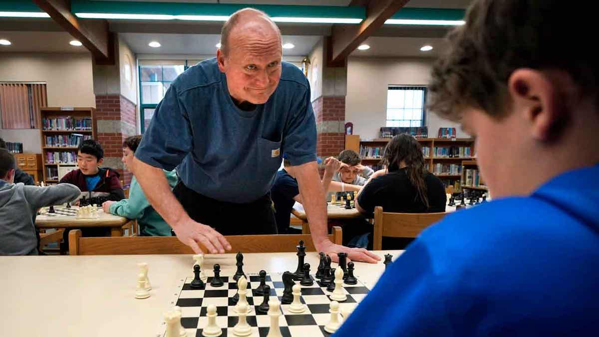 Custodian and chess coach David Bishop 