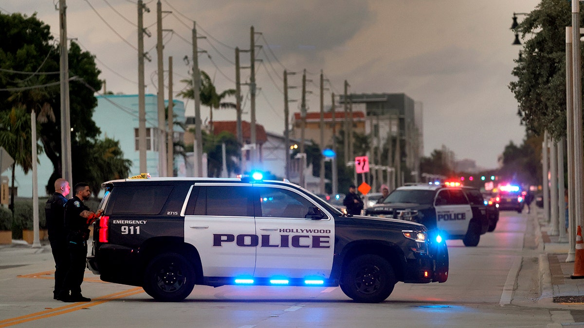 A police car at an intersection