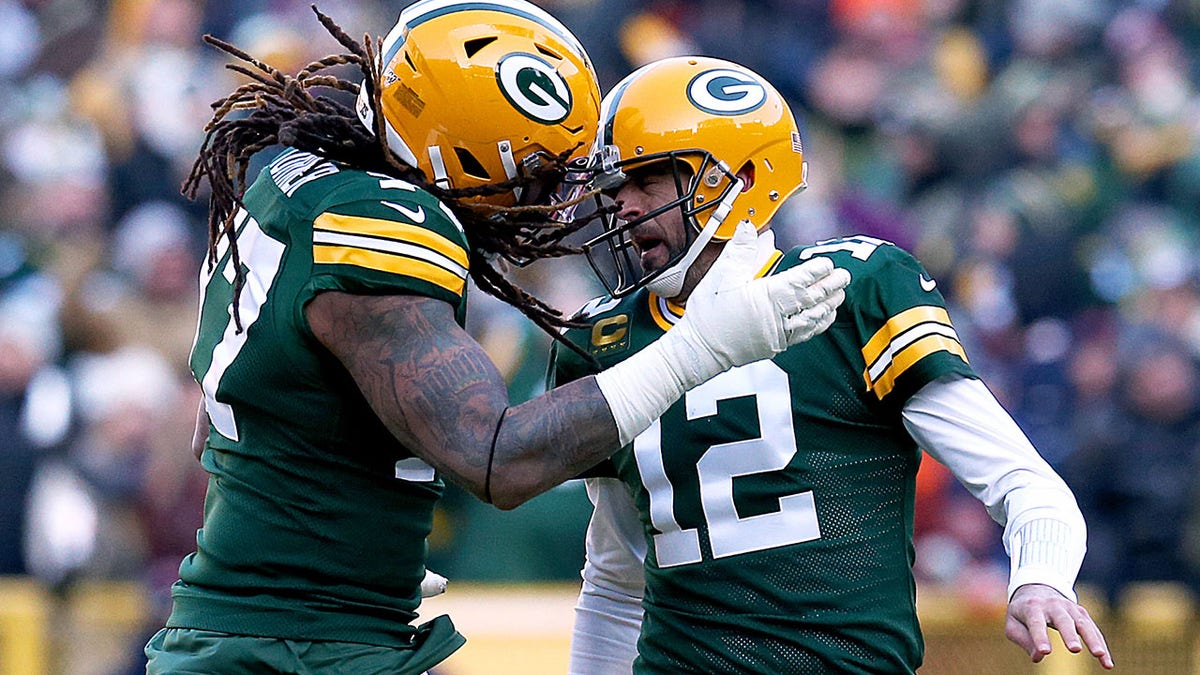 Aaron Rodgers and Billy Turner