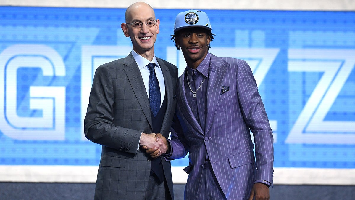 Adam Silver and Ja Morant pose during NBA Draft