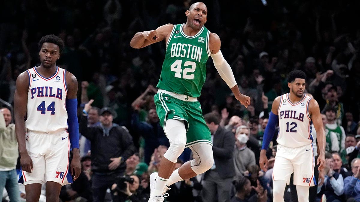 Al Horford celebrates