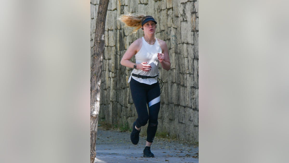 Amber Heard jogging in Spain