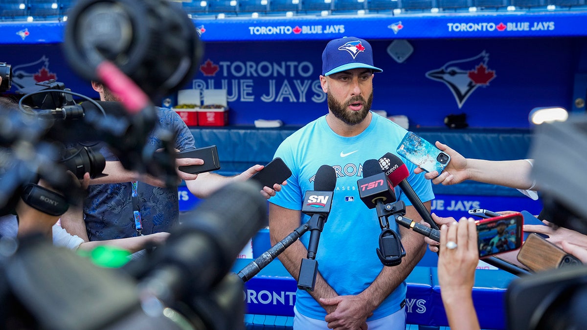 Anthony Bass in the dugout