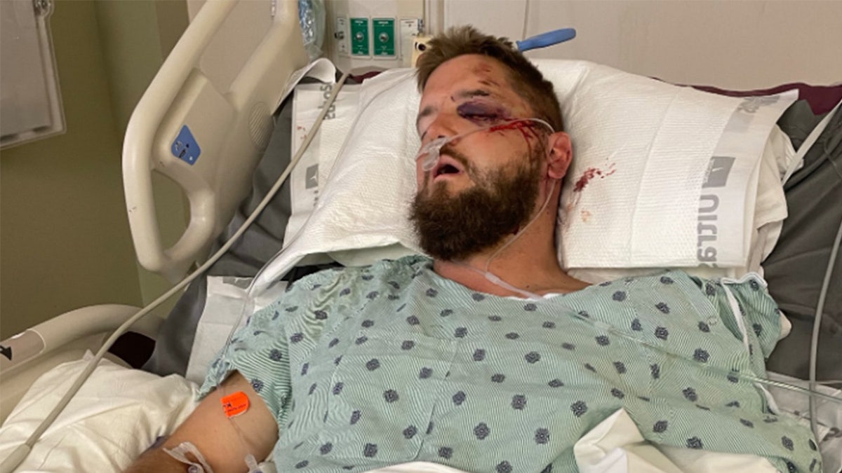 Aric Hutchinson shown in his hospital bed.