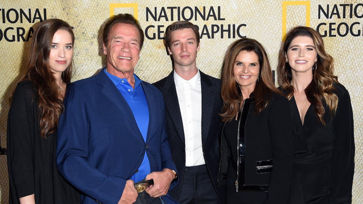 Arnold Schwarzenegger and Maria Shriver with their kids