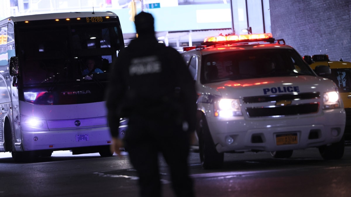 police escort migrant bus in NYC