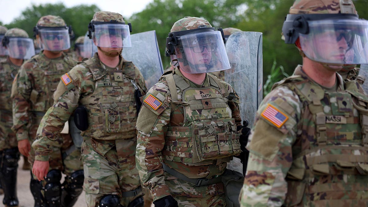 BROWNSVILLE, TEXAS - MAY 10: Members of the Texas National Guard are deployed to an area of high migrant crossings along the United States border with Mexico on May 10, 2023 in Brownsville, Texas. A surge of immigrants is expected with the end of the U.S. government's Covid-era Title 42 policy, which for the past three years has allowed for the quick expulsion of irregular migrants entering the country. More than 29,000 individuals are in U.S. Customs and Border Protection custody, including nearly 18,000 in the last 24 hours. (Photo by Joe Raedle/Getty Images)