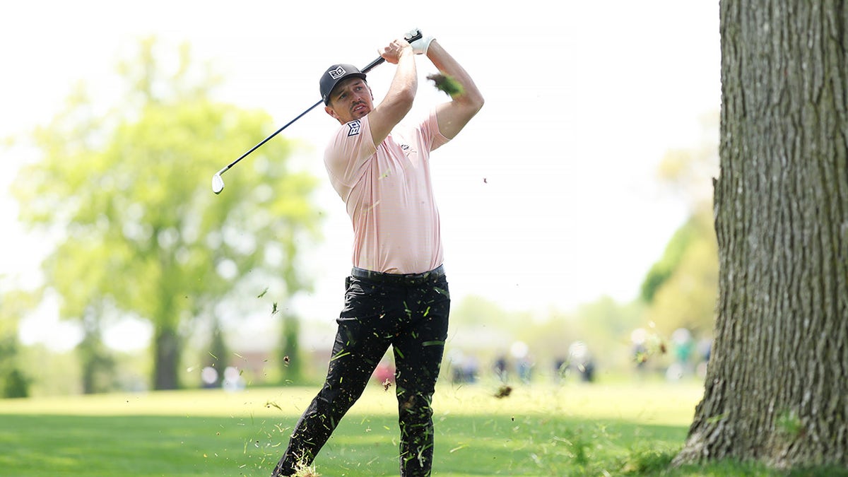 Bryson DeChambeau finishes swing