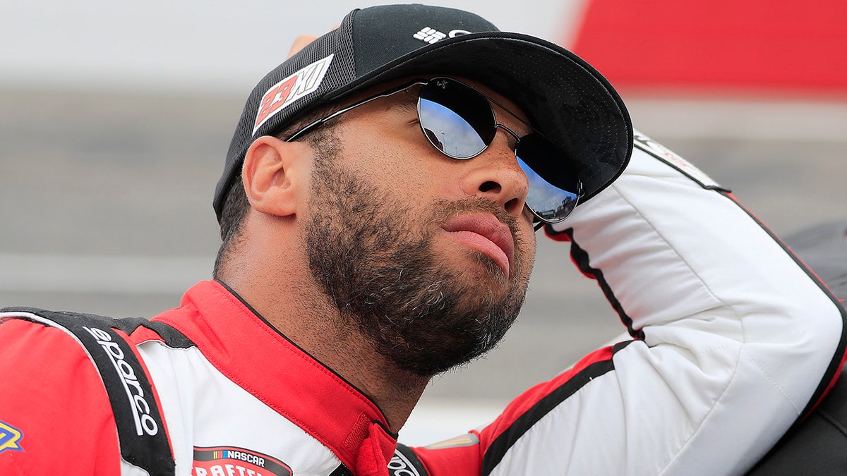 Bubba Wallace looks on