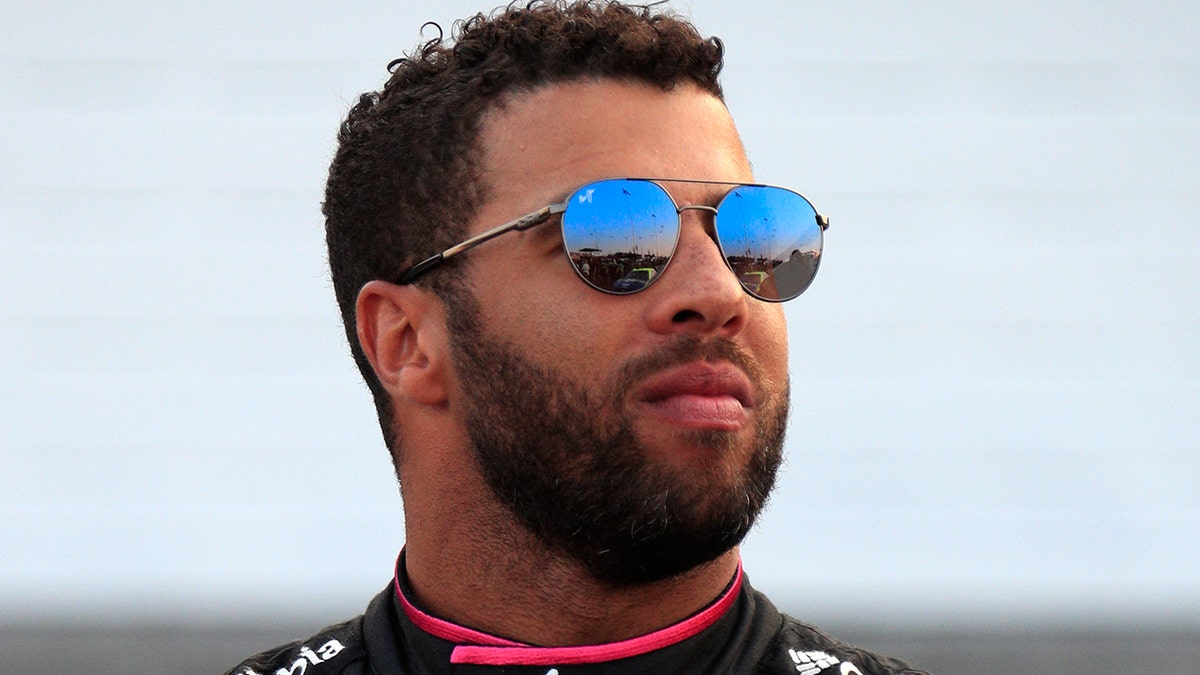 Bubba Wallace looks on