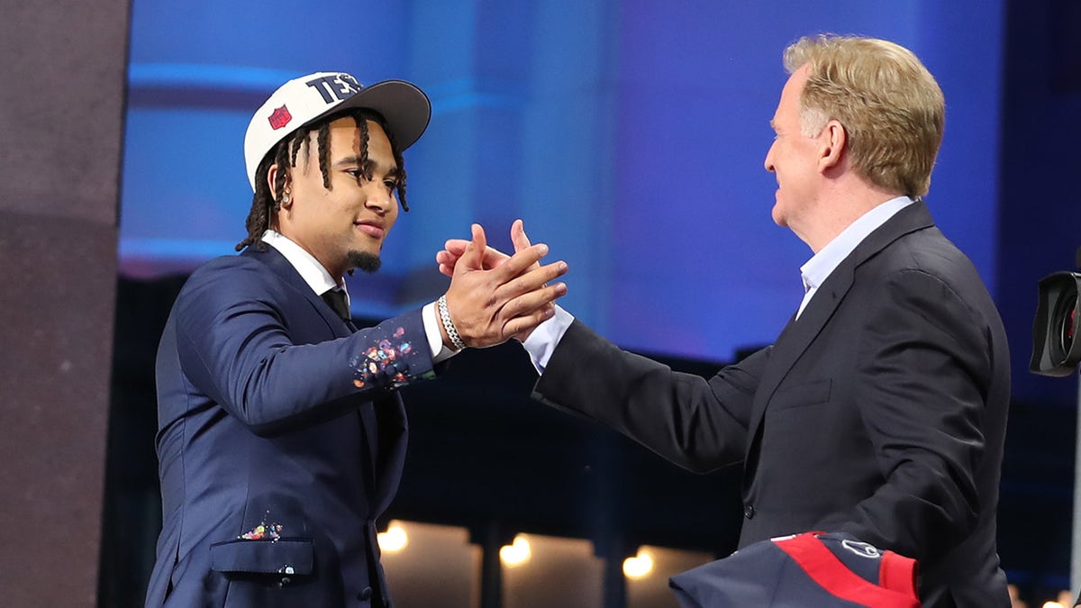 CJ Stroud shakes hands with Roger Goodell