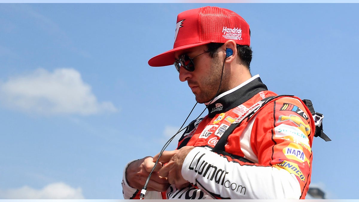 Chase Elliott fixes earpiece