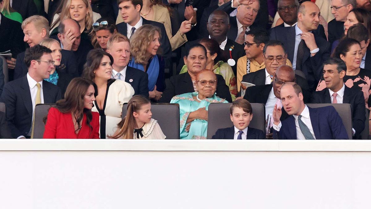 Catherine, Princess of Wales, Princess Charlotte of Wales, Prince George of Wales and Prince William, Prince of Wales are seen during the Coronation Concert