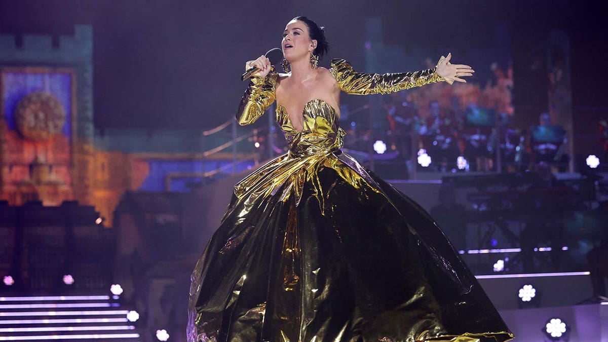 Katy Perry rocks gold gown at coronation concert for King Charles