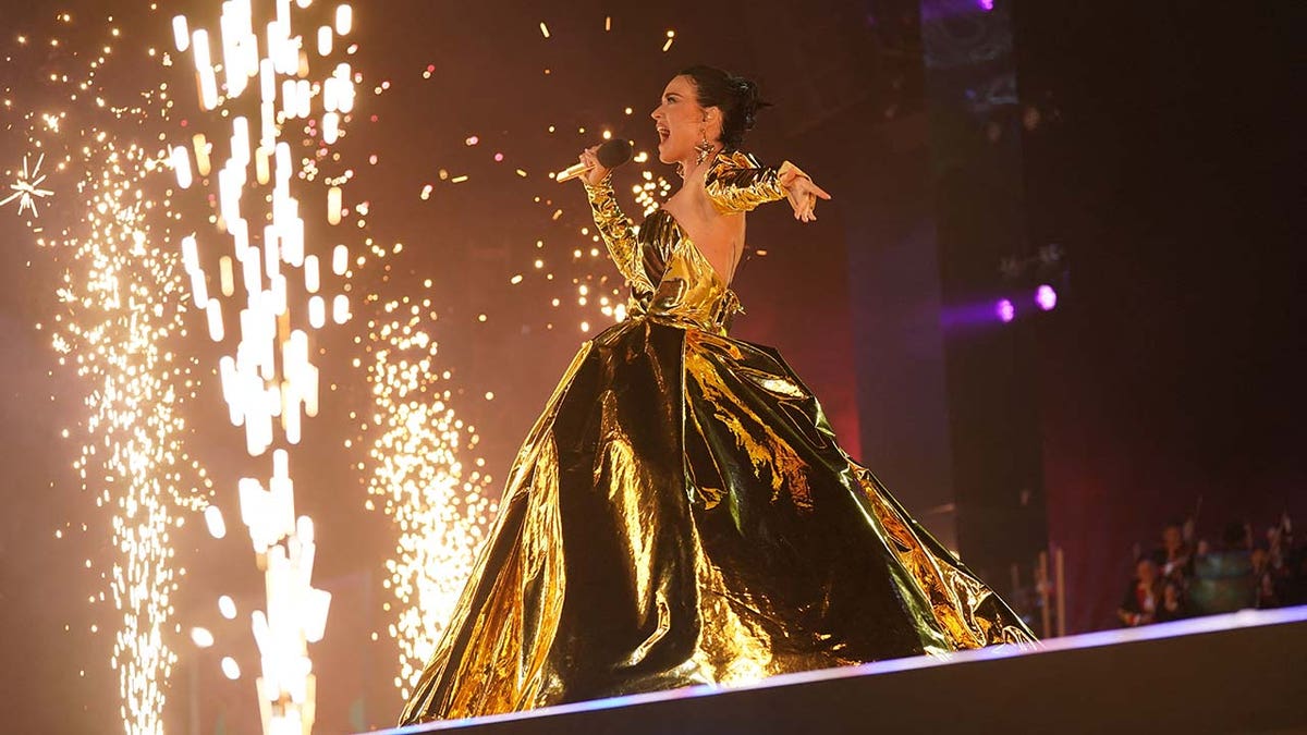 Katy Perry wears gilded gown for coronation concert at Windsor Castle.