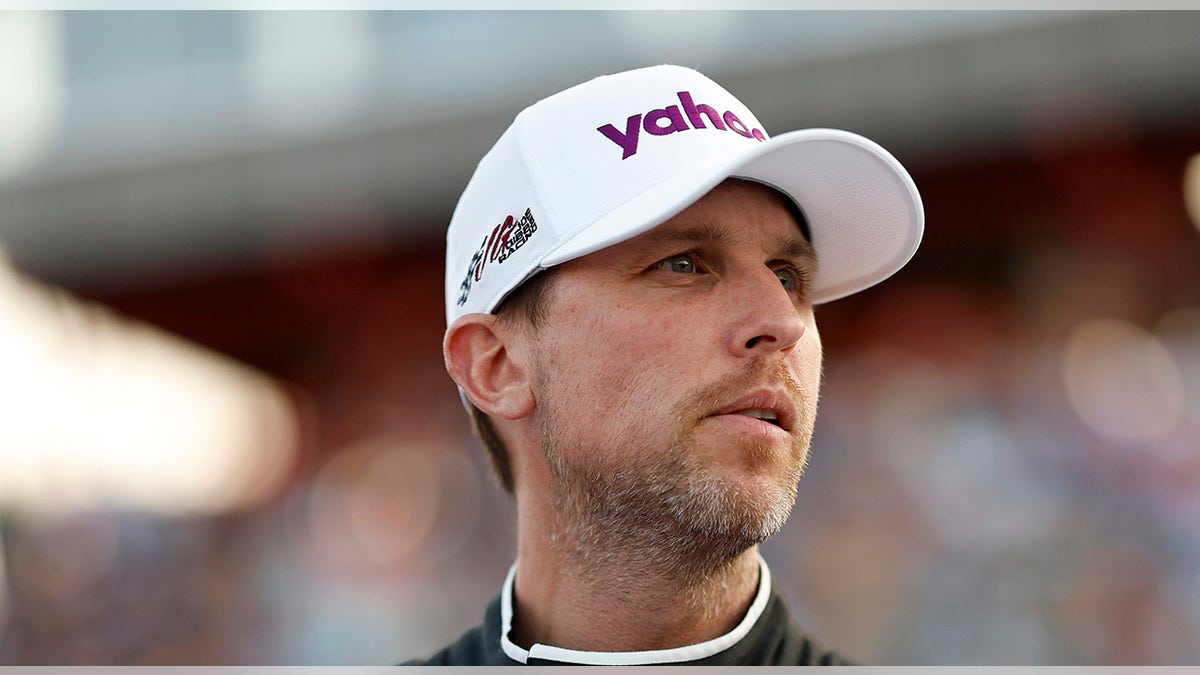 Denny Hamlin looks on