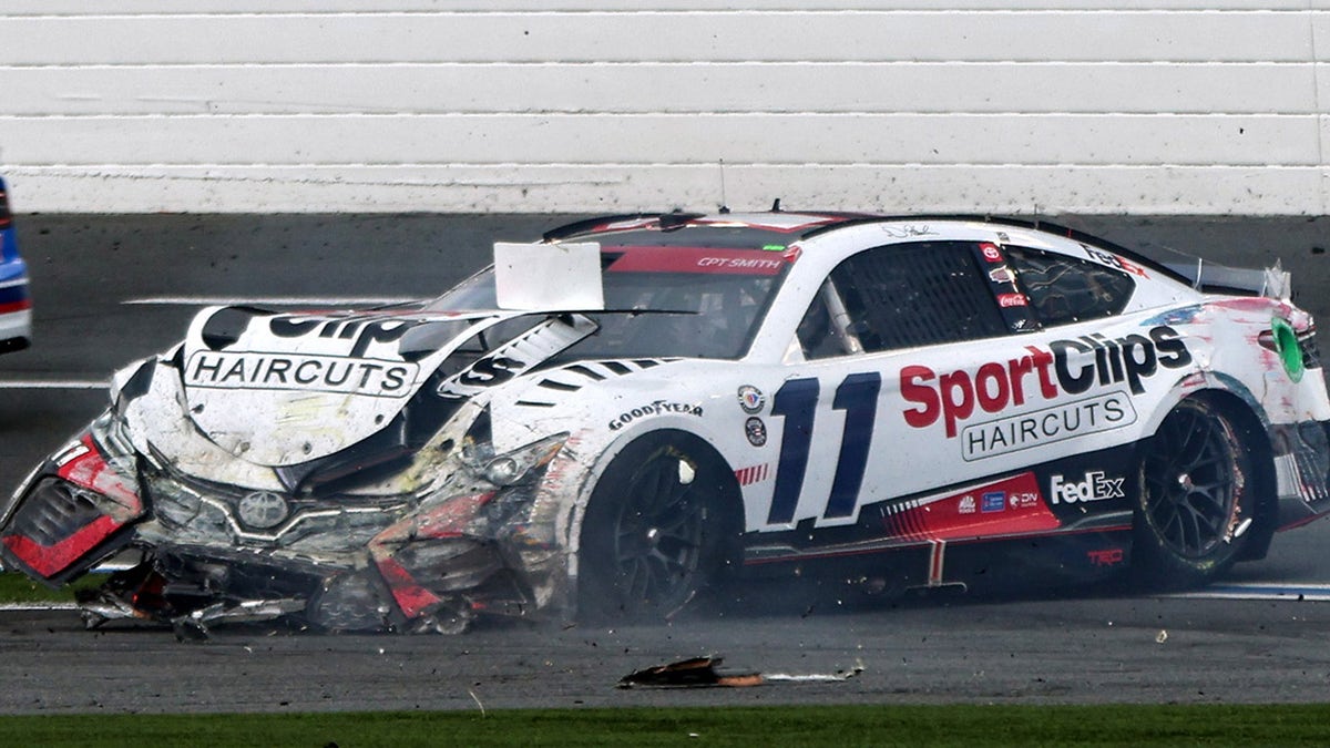 Denny Hamlin with crashed car