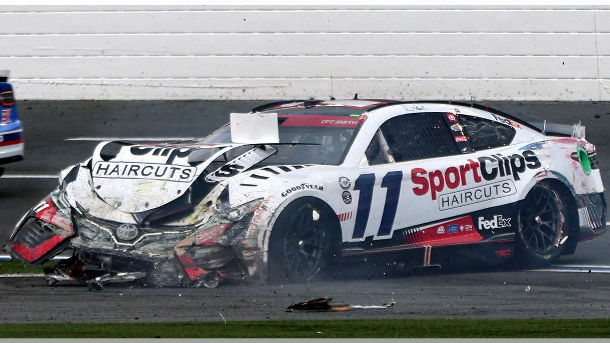 Denny Hamlin with crashed car