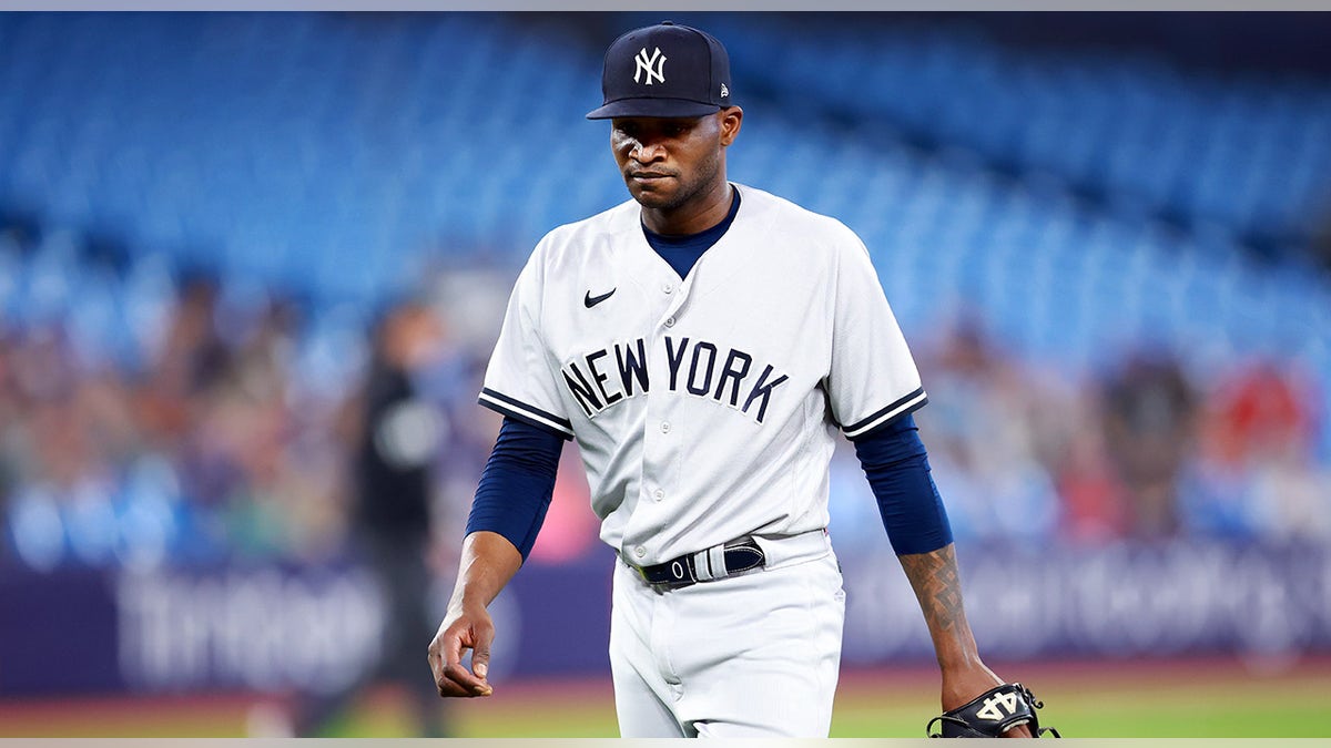 Domingo German walks off field