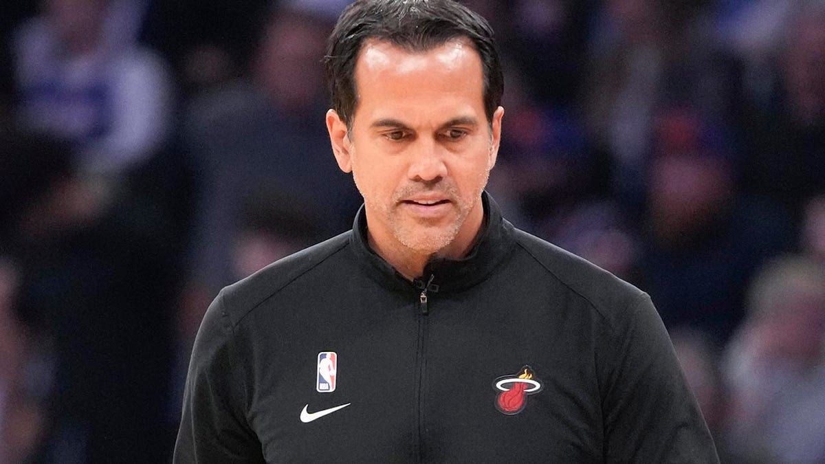 Erik Spoelstra looks down