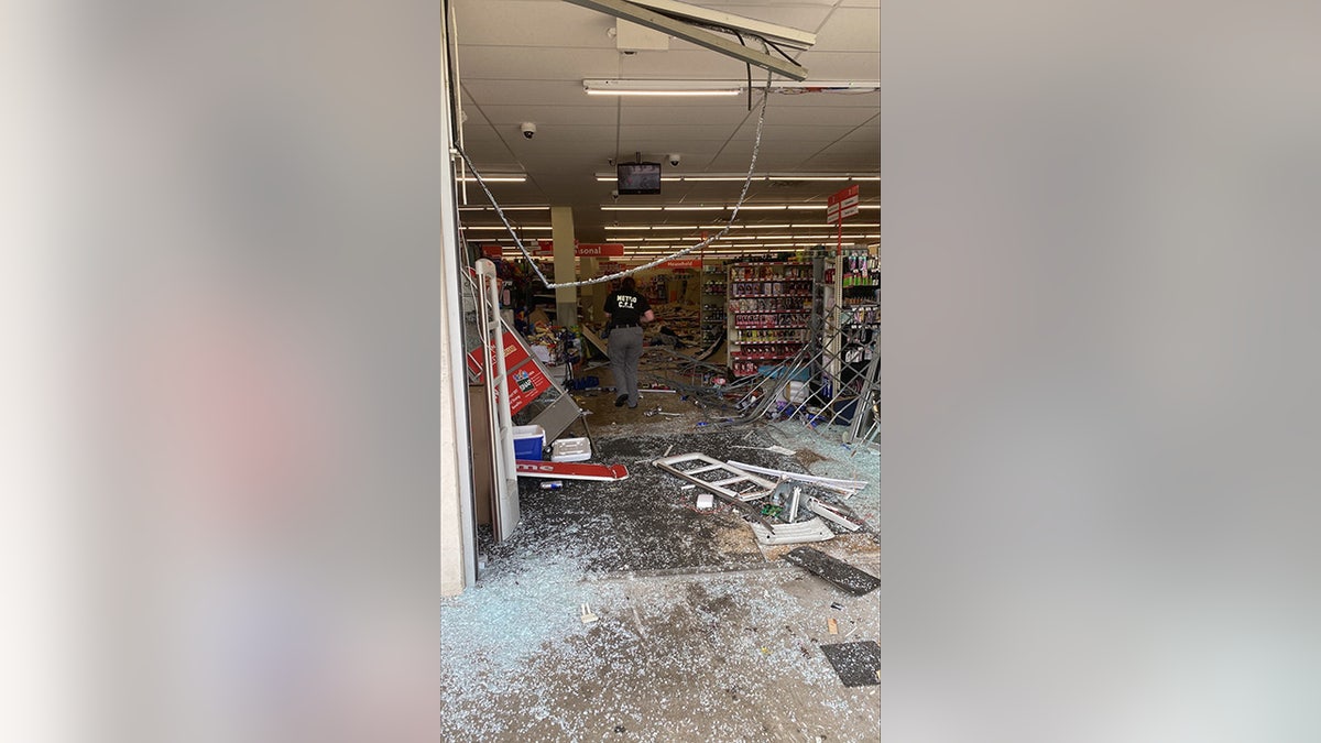 shattered glass inside Family Dollar store