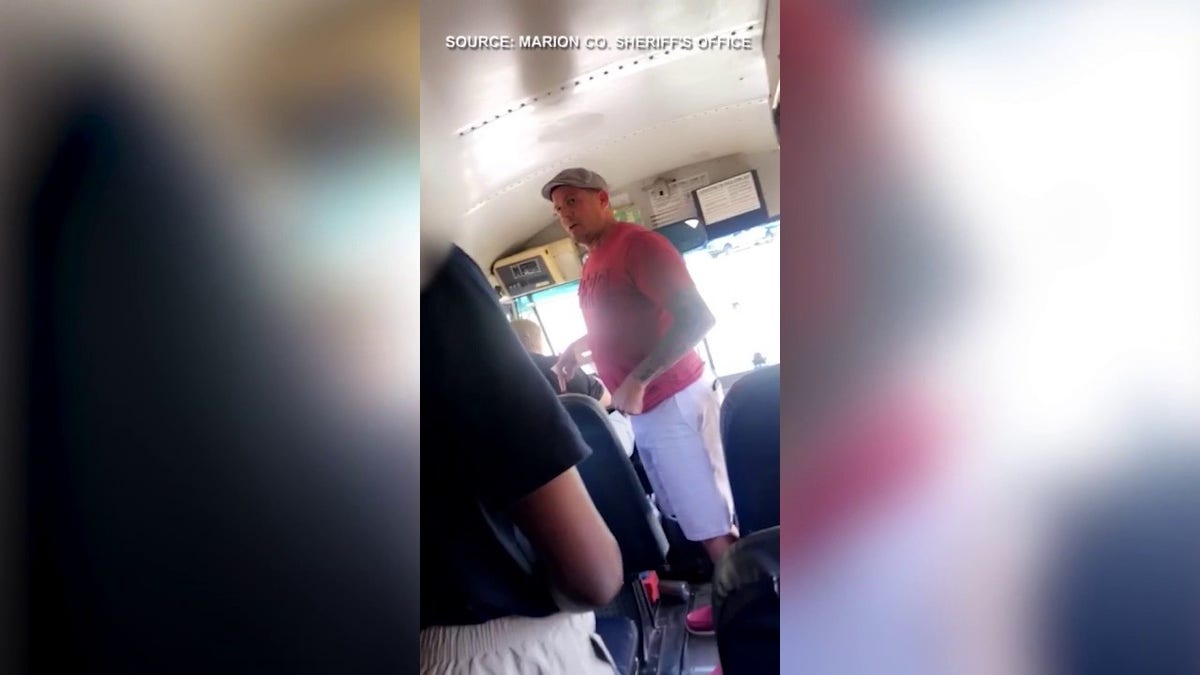 Florida man seen hitting school bus aide