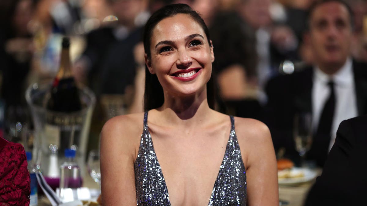 Gal Gadot smiles for a photo