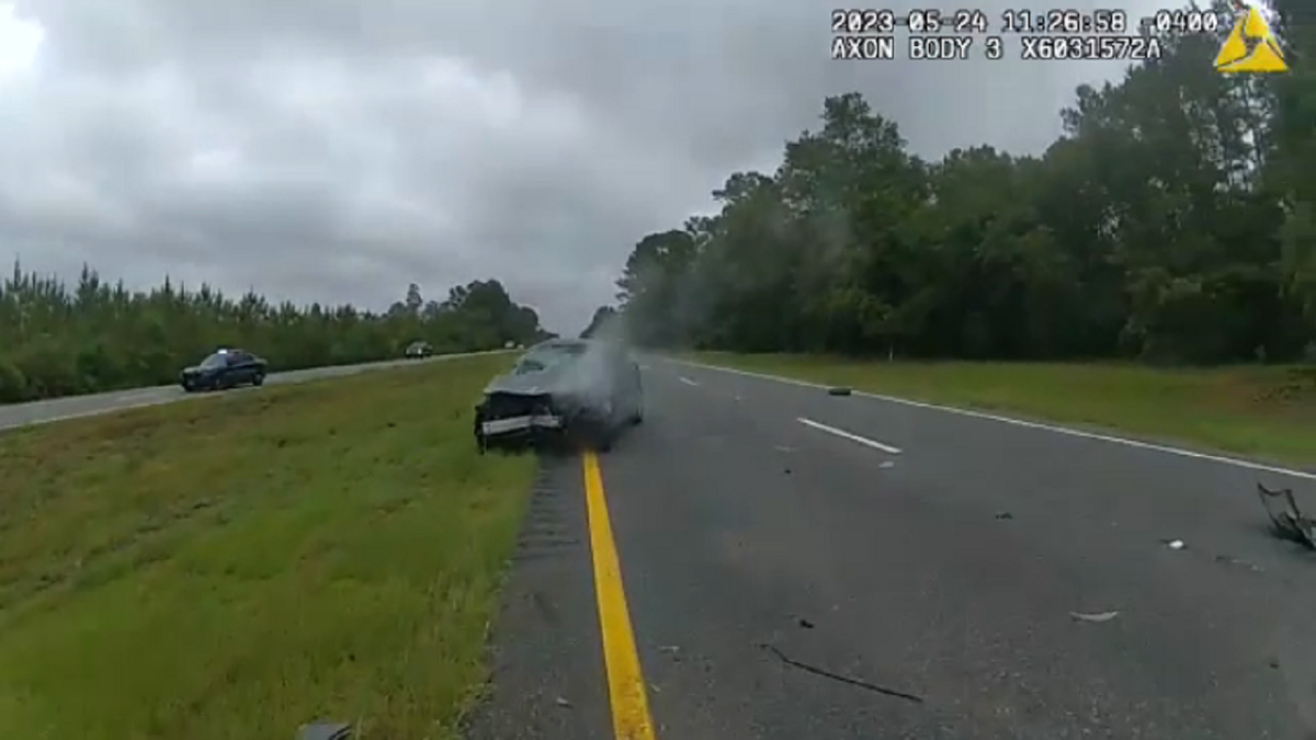 Car smoking in Georgia after highway accident