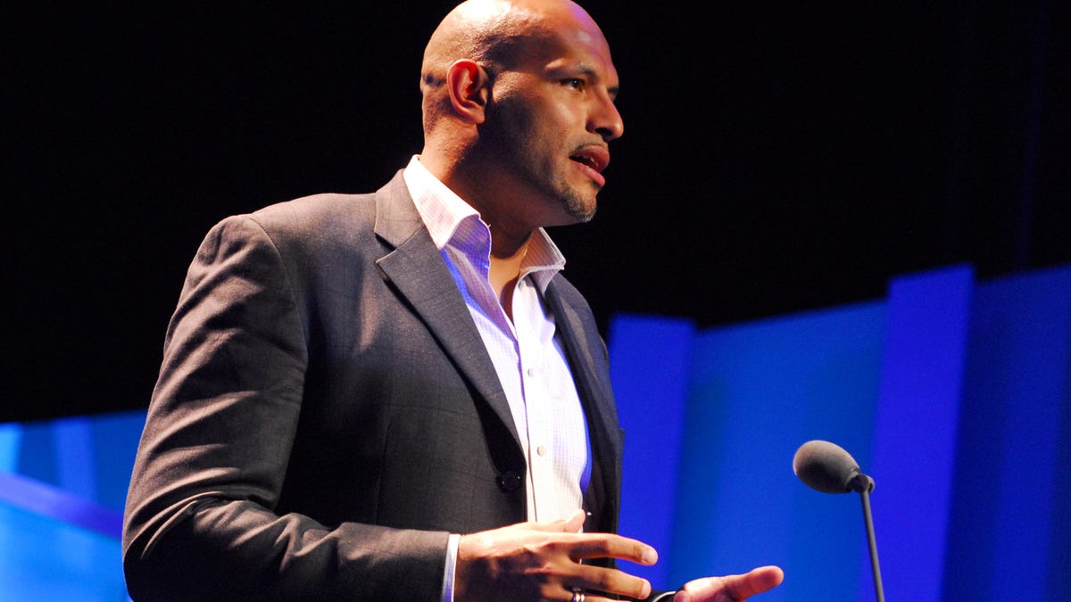 John Amaechi speaks at an awards show