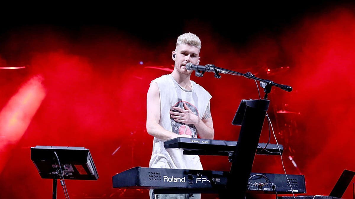 colton dixon singing at keyboard