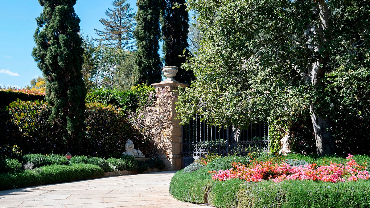 Outside shot of Prince Harry and Meghan Markle's gate to their Montecito home, with bright flowers