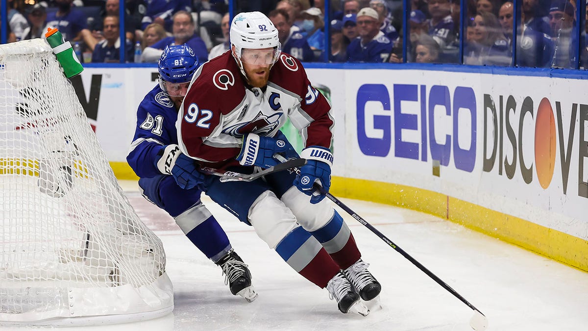 Gabriel Landeskog skates around the net