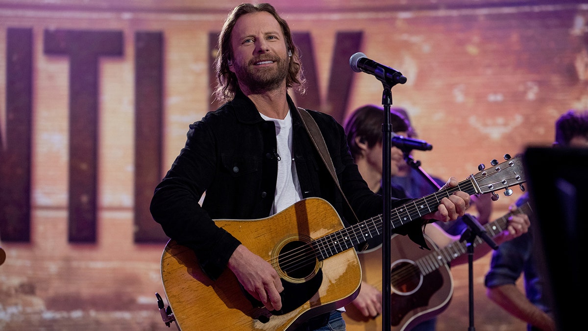 Dierks Bentley on stage at the TODAY show with a guitar