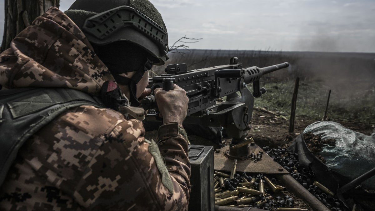 Ukraine soldiers fire on front lines