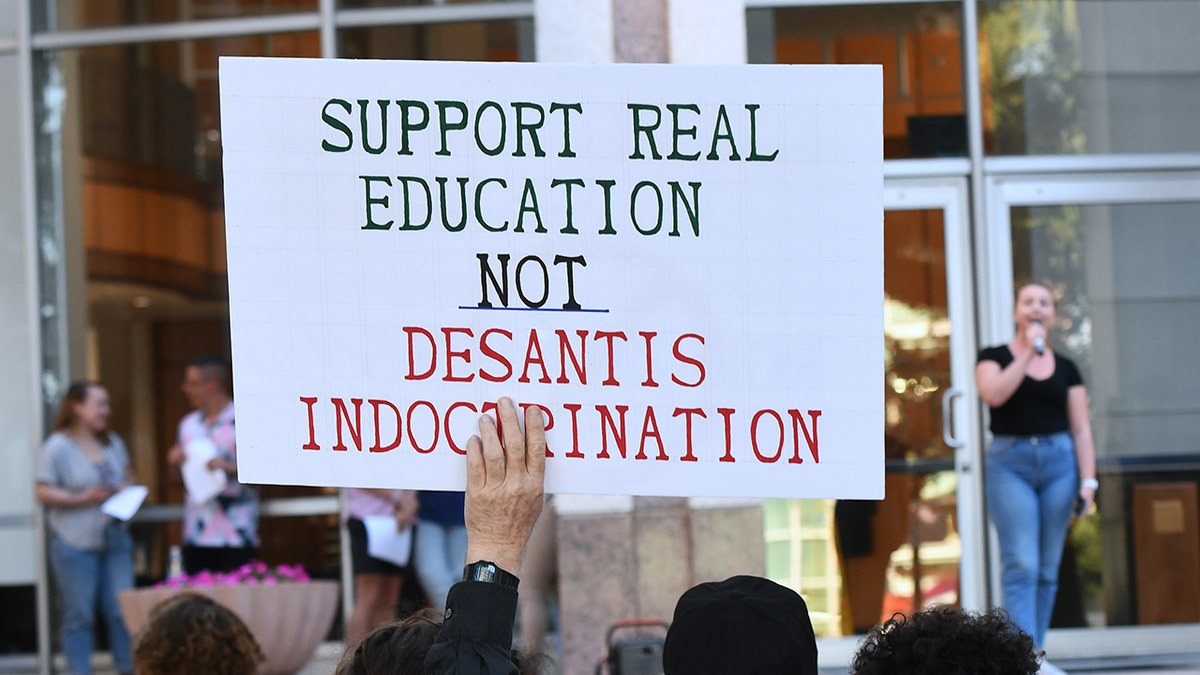 Protesters with signs