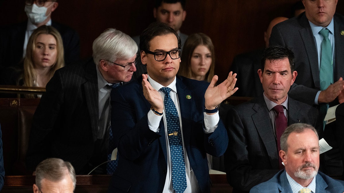 Santos clapping in Congress