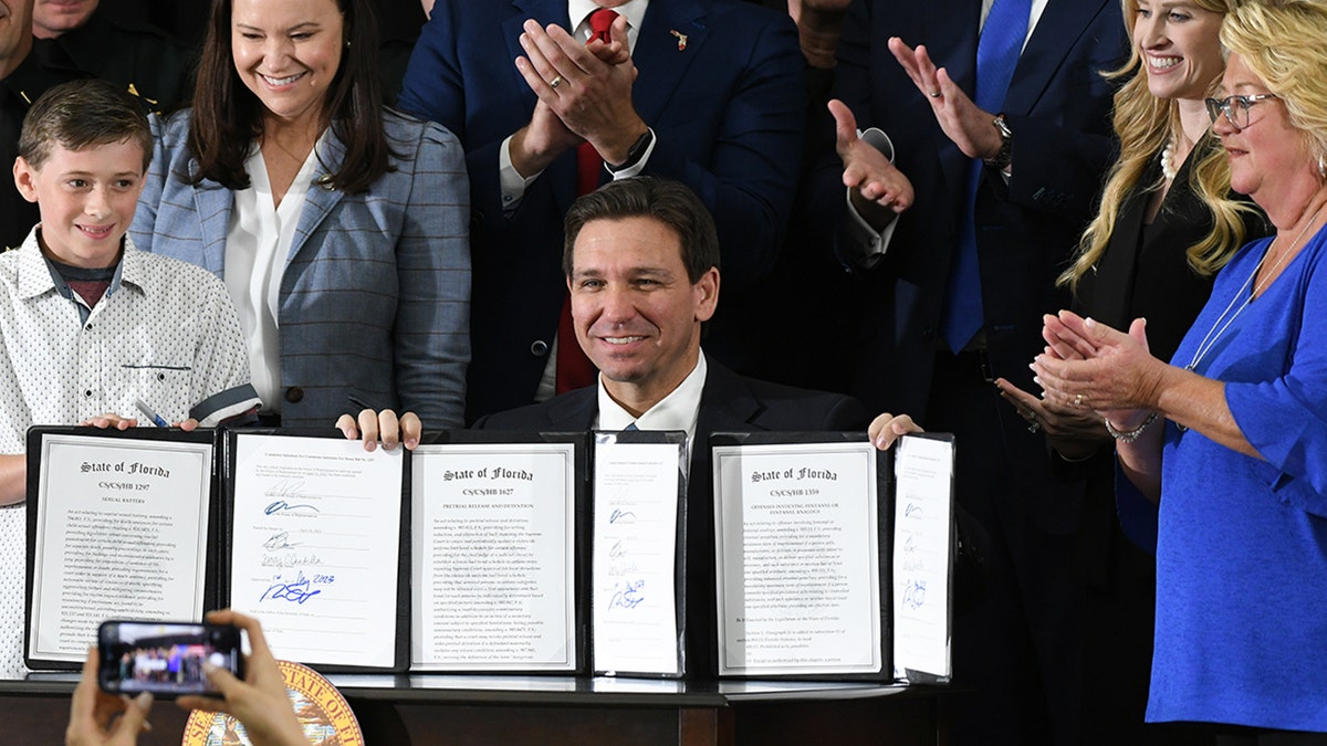 DeSantis holding signed bills