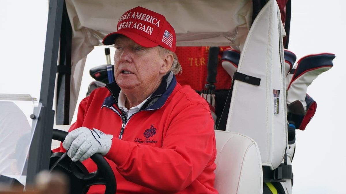 Trump playing golf