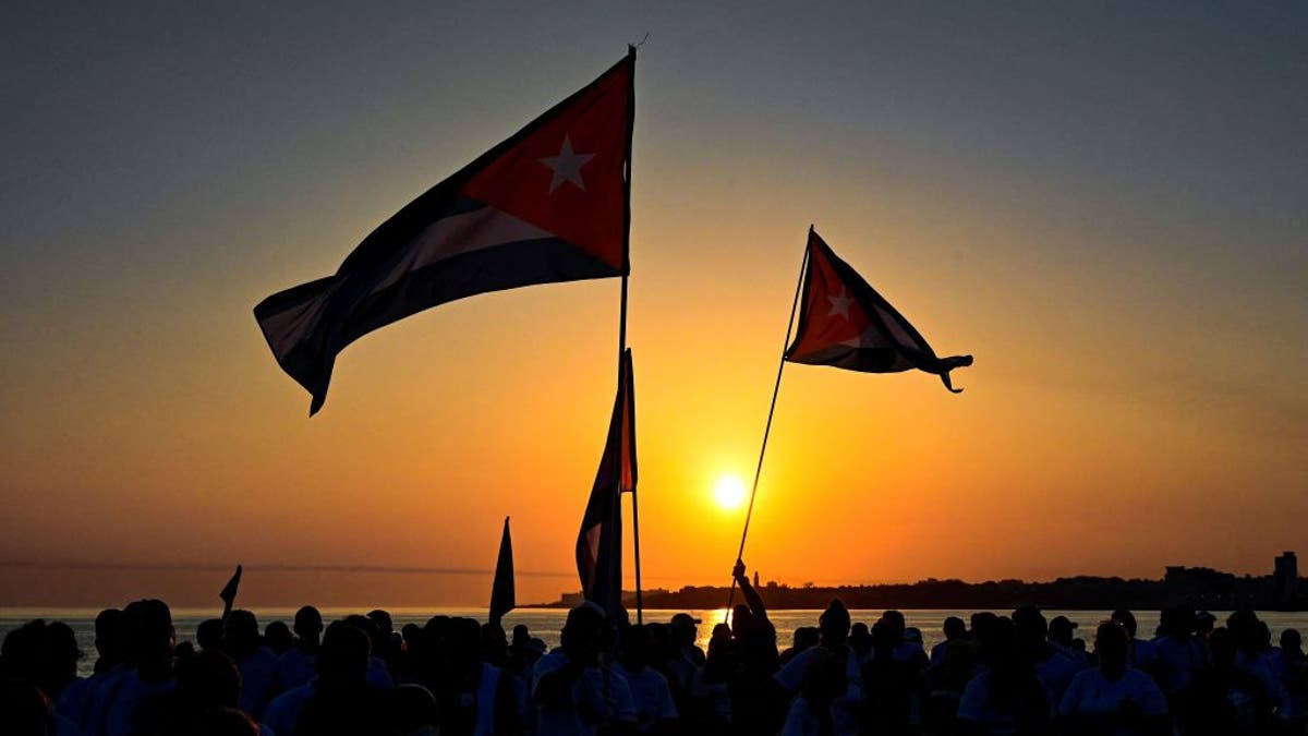 Cuban protesters at dusk
