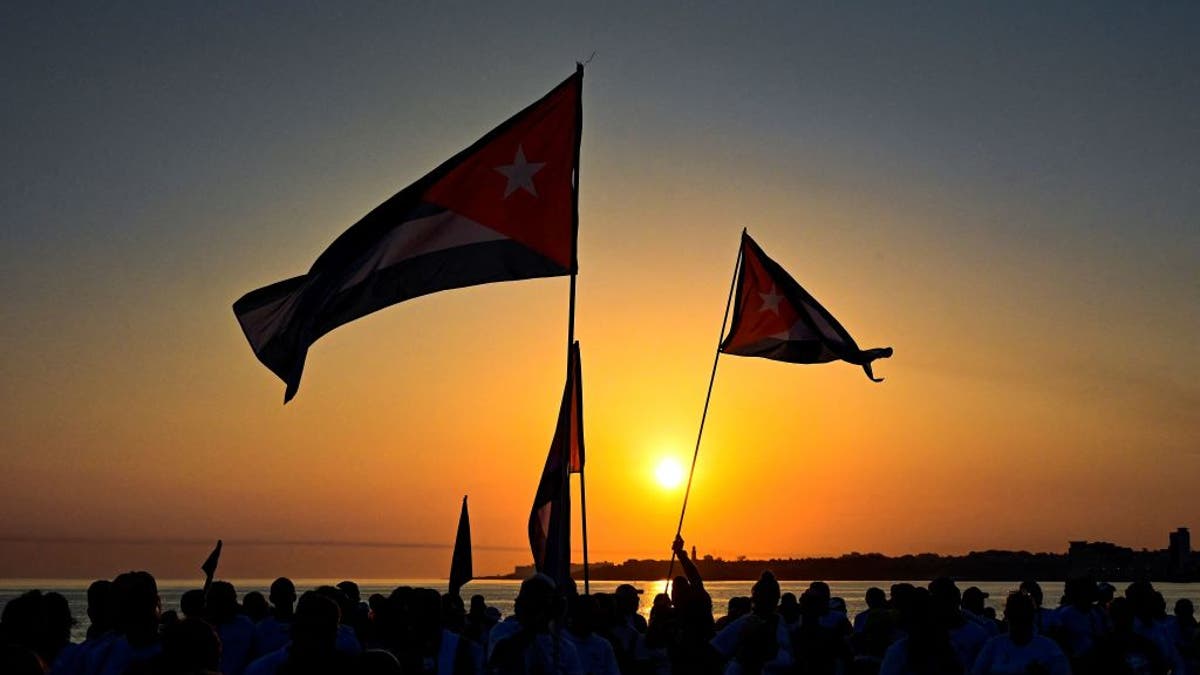 Cuban protesters at dusk