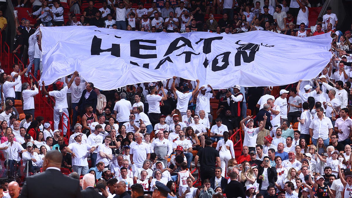 Miami Heat fans cheer during Game 4