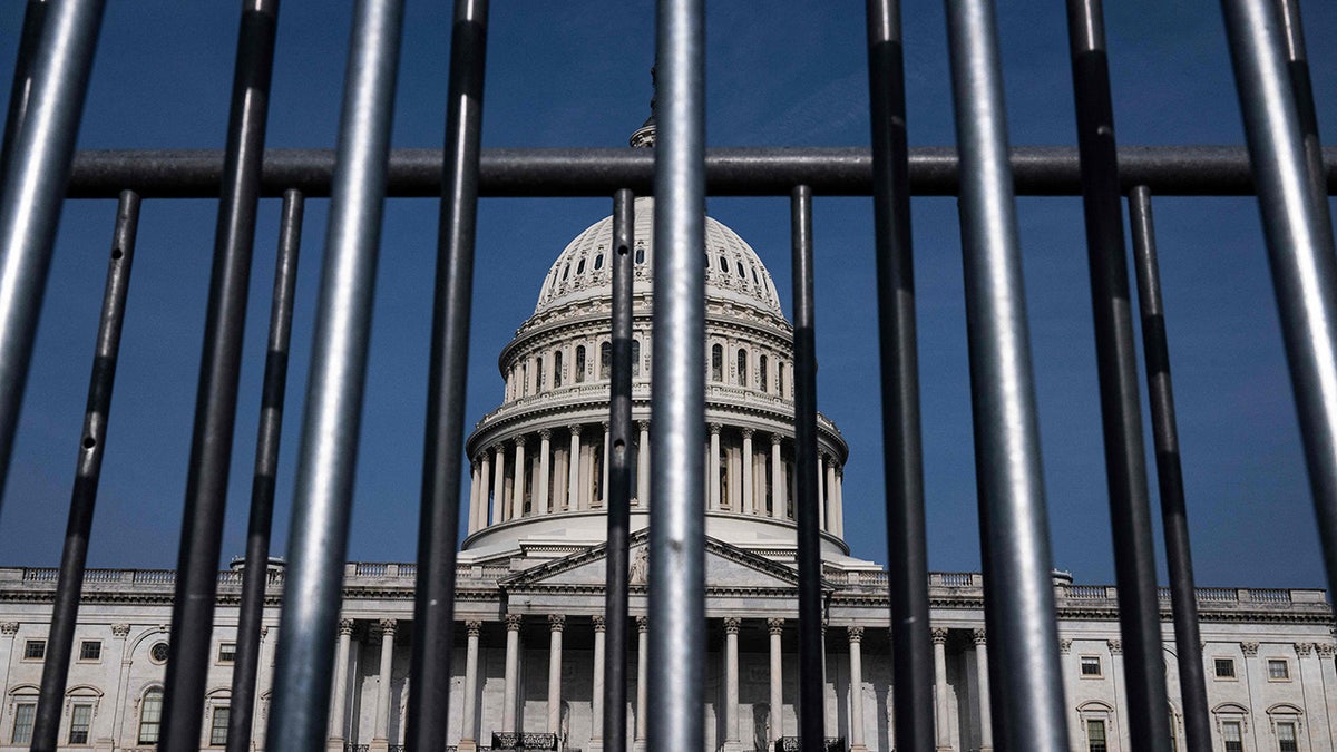 US Capitol with fencing around it