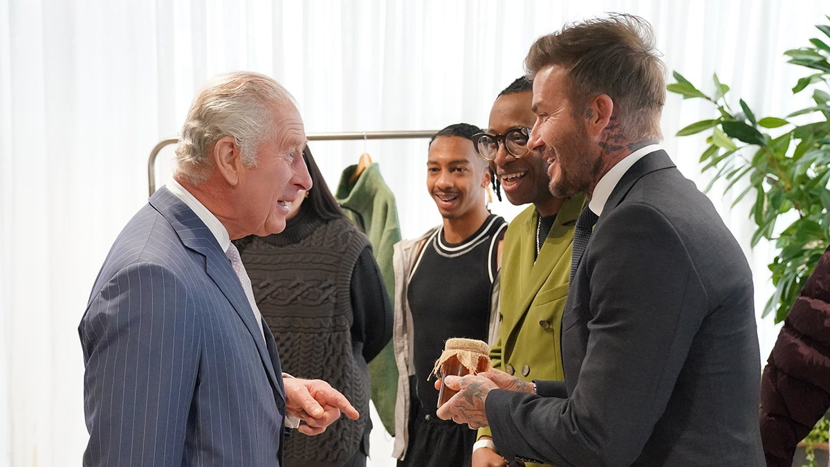 King Charles talking with David Beckham