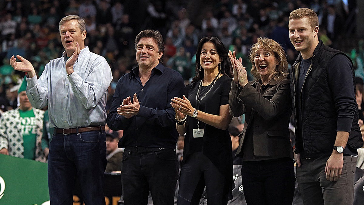 Charlie Baker, son and wife at Celtics basketball game