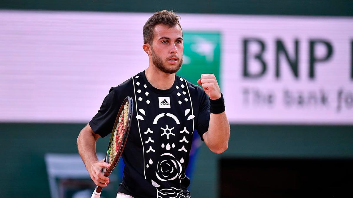 Hugo Gaston reacts to a point during the 2022 French Open