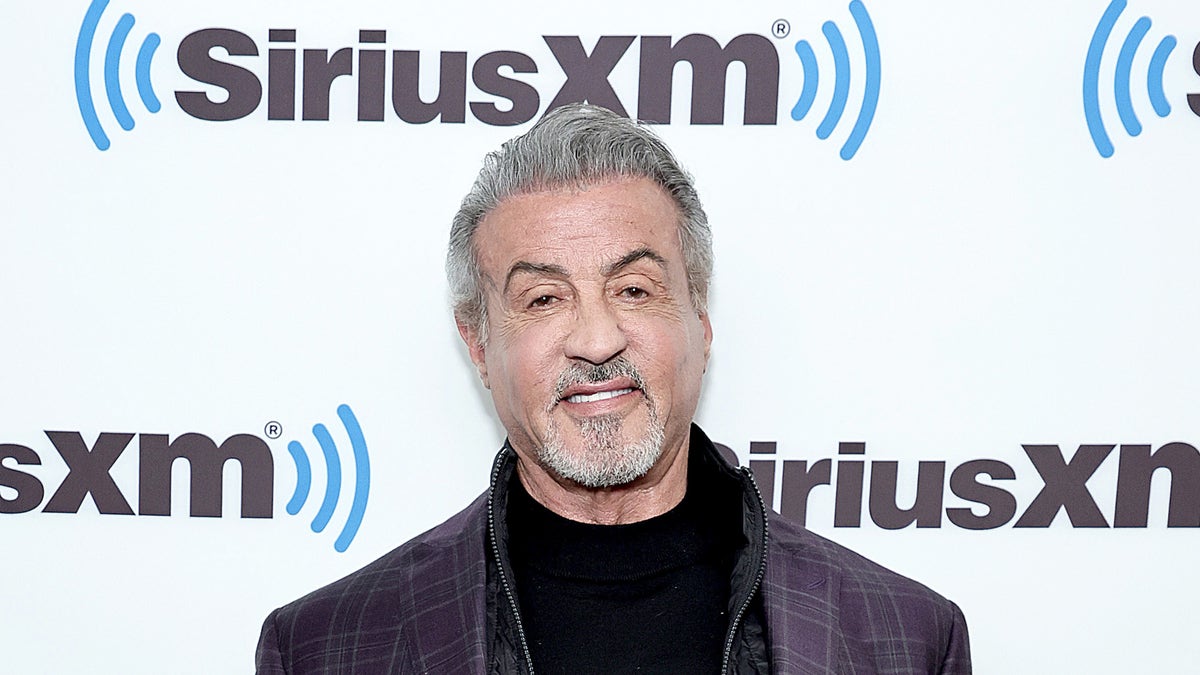 Sylvester Stallone in front of a Sirius XM backdrop