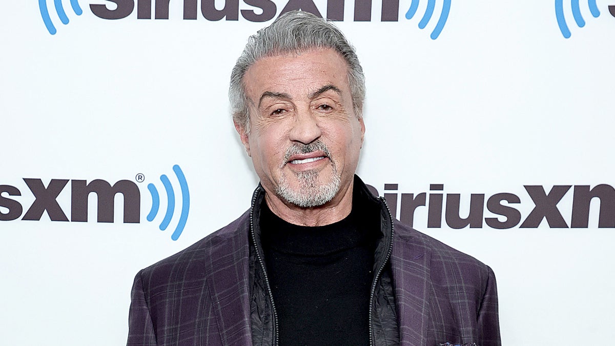 Sylvester Stallone in front of a Sirius XM backdrop