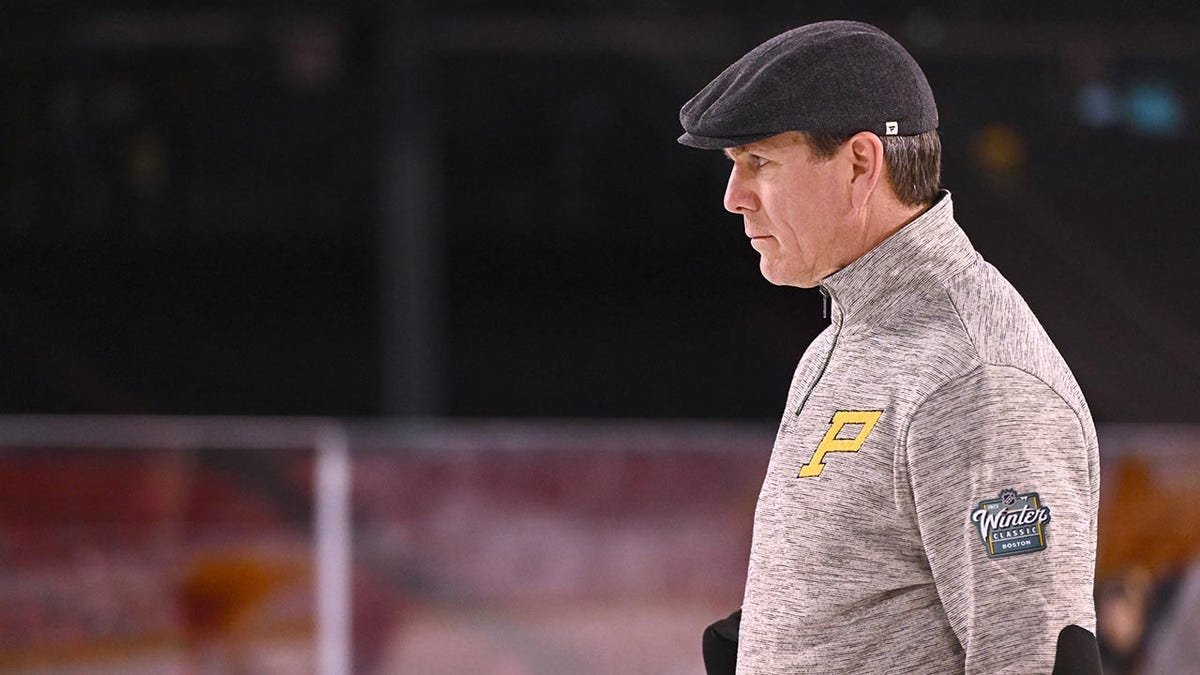 Penguins head coach Mike Sullivan looks on during a practice before the Winter Classic