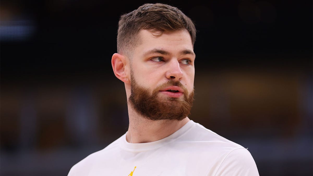 Hunter Dickinson looks on before a game against Rutgers