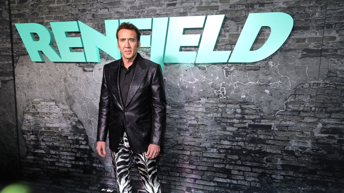 Nicolas Cage at the Renfield premiere in animal print pants.